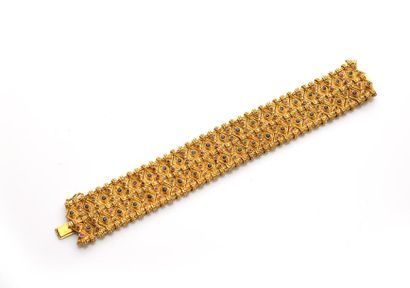 null Bracelet ruban en or (750 millièmes) à motifs losangiques perlés et tressés...