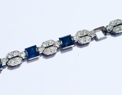 null Bracelet articulé en or gris (750 millièmes) et platine (950 millièmes) orné...