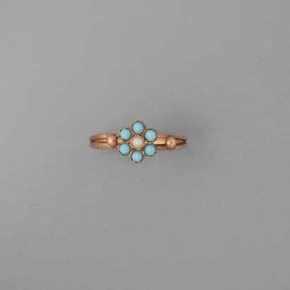 null Bague myosotis en or 750 °/°° ornée d'une perle bouton dans un entourage de...