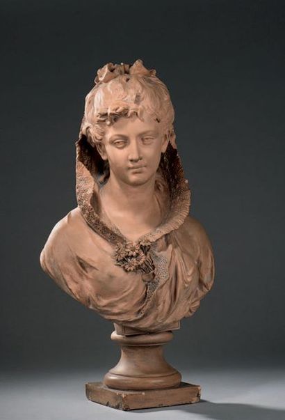 Mathurin MOREAU (1822-1912) 
Jeune femme au corsage fleuri
Buste en terre cuite signée...