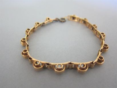 null Bracelet ruban articulé, motifs escargots en or jaune. 

Poids : 7,6 g.