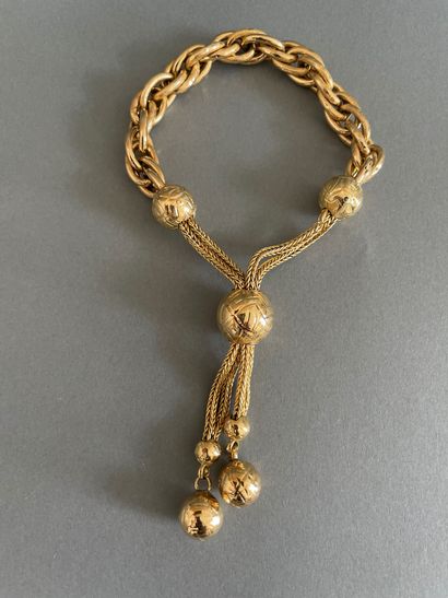 Bracelet chaîne torsadée en or jaune orné...