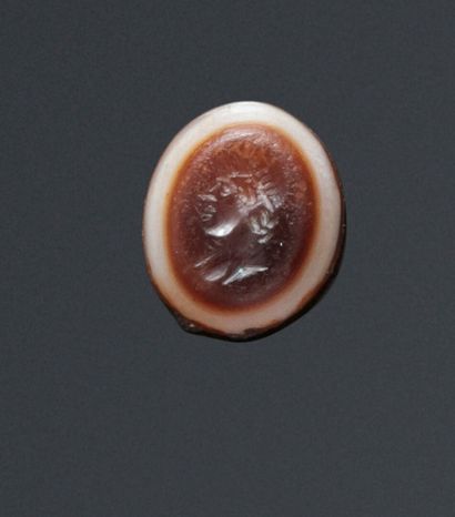 A truncated oval intaglio engraved with a...