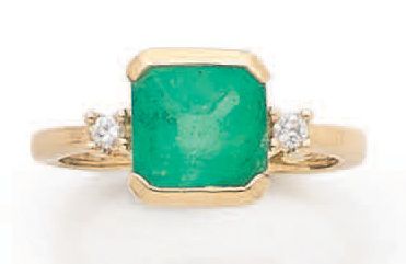 Ring decorated with a square emerald with...