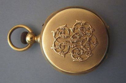 null Pocket watch, the yellow gold guilloché case adorned with an applied monogram....