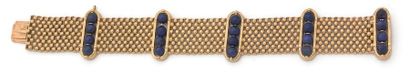 null Egyptian cuff bracelet in soft mesh with half spheres of yellow gold 750‰ punctuated...