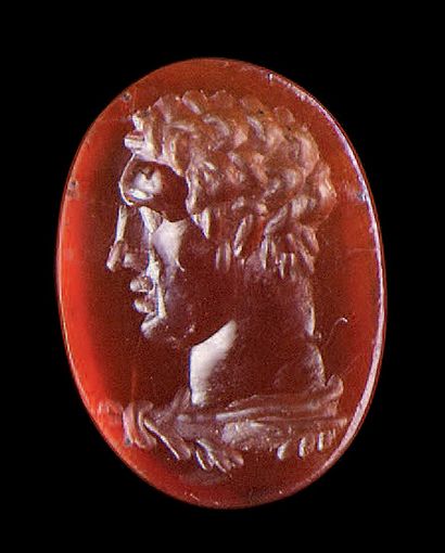 null Flat oval intaglio engraved with a profile of a young Hercules with curly hair...