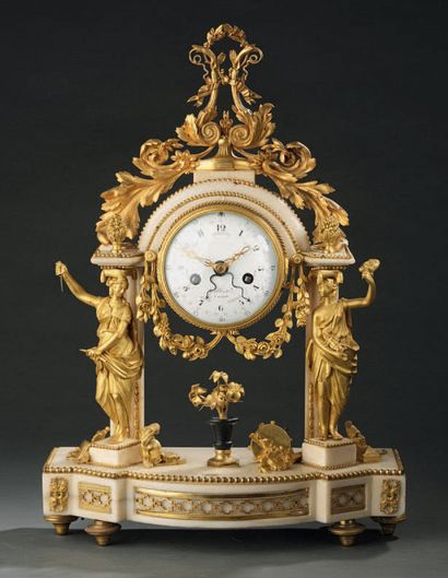null Gilt bronze clock, the dial with Arabic numerals indicating the day of the week...