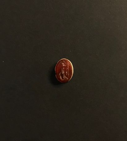 null Oval frustoconical intaglio engraved with a standing Minerva. Carnelian. Roman...