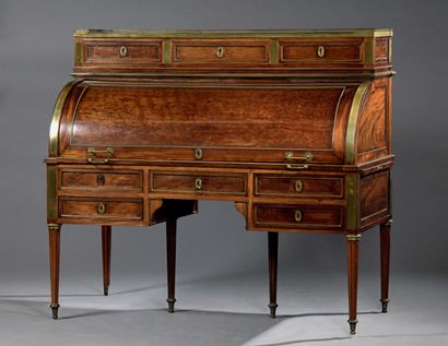 null Mahogany speckled mahogany cylinder desk (all sides), opening with seven drawers...