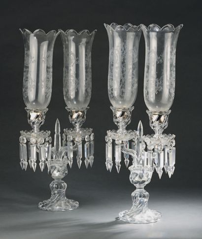 BACCARAT Pair of moulded and cut crystal two-light torches, the shaft with twisted...