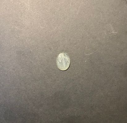 Flat oval intaglio engraved with a nude woman...