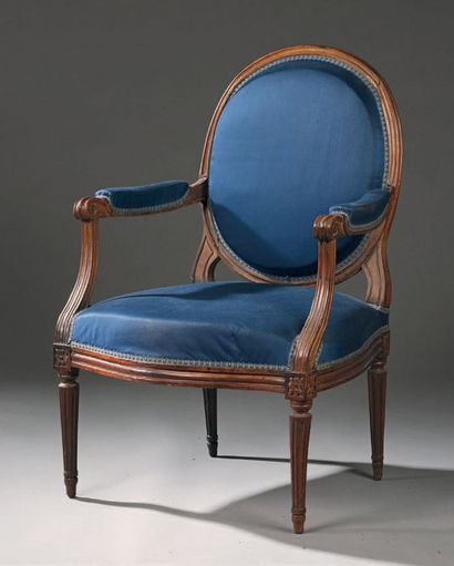null Armchair in stained beech wood, moulded with a flat backrest in medallion, resting...