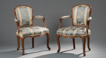 null Pair of small moulded beech armchairs with cabriolet backs, resting on arched...