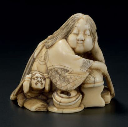 JAPON - Epoque MEIJI (1868-1912) 
Petit okimono en ivoire dans le style des netsuke,...
