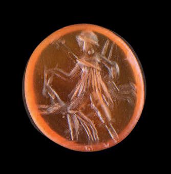 null Flat oval intaglio engraved with a hunting Diana. Carnelian. Roman art, 2nd...