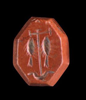 null Octagonal intaglio depicting two stylized fish hanging from an anchor. Red jasper....