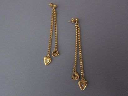 null Christian LACROIX

Paire de pendants d'oreille en métal doré composés de deux...