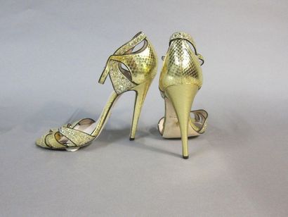 null Elie SAAB Haute Couture

Paire de sandales du soir en "python" et paillettes...
