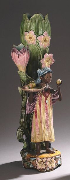null FRENCH WORK

Young african girl with fruits

Natural polychrome glazed ceramic...