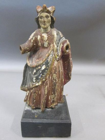 null Sainte Philomène

Statuette en bois sculpté peint polychrome. 

XVIIIème siècle....