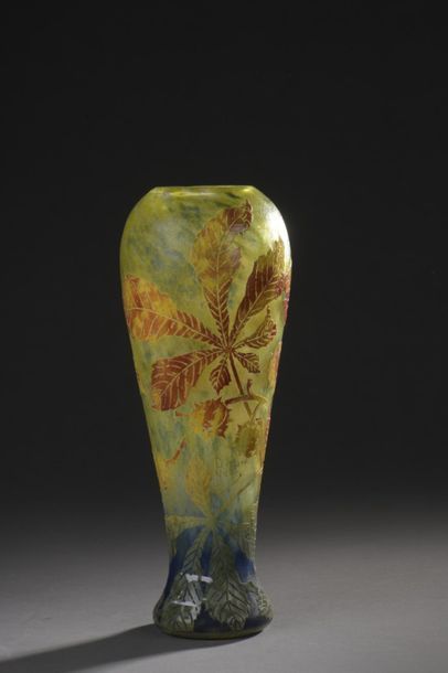  DAUM Slightly conical ovoid vase on base bulbous. Marbled lined glass print orange-yellow...