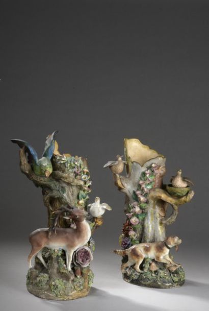  FRENCH WORK 
Pair of ceramic vases with top decoration 
relief of a hunting dog...