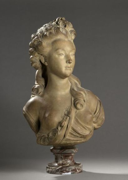 null D'après Jean-Jacques CAFFIERI (1724-1792)

Buste de jeune femme à la rose

Terre...
