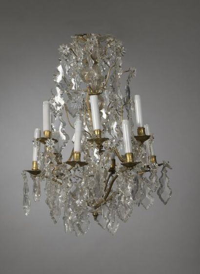  Chandelier in gilt bronze with twelve lights on two 
rows, decorated with glass...