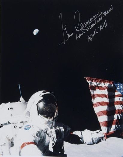 null NASA / Harisson SCHMITT

 Apollo 17: Gene Cernan holding the American flag with...