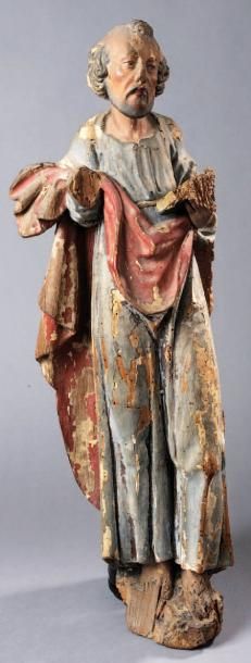 Une statue en bois polychrome sujet évangéliste....