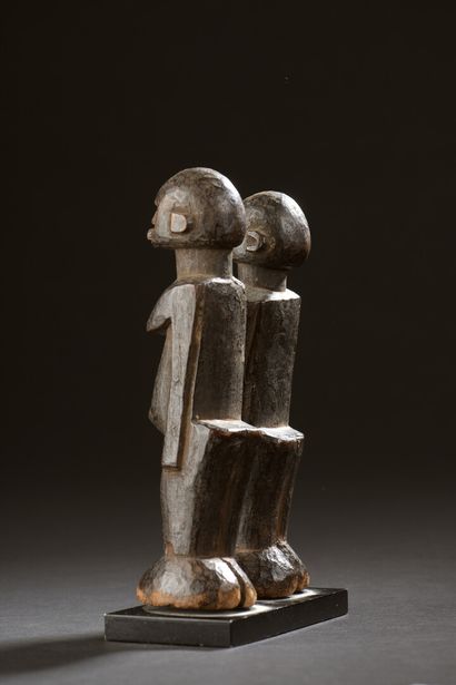  Couple of Lobi statuettes, Burkina Faso 
Wood with a shiny brown patina, grainy...