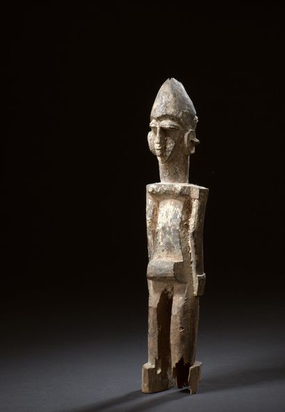  Lobi statuette, Burkina Faso 
Wood with brown patina, traces of black pigments,...