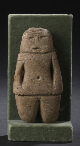 null Standing figure with stylized features


Grey stone with brown patina.


Guerrero...