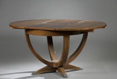  CONTEMPORARY WORK 
Middle table in rosewood veneer with a circular top slightly...