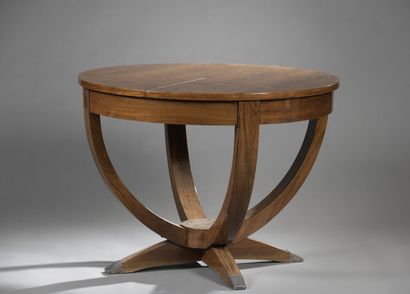  CONTEMPORARY WORK 
Middle table in rosewood veneer with a circular top slightly...