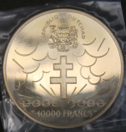 null Monnaie en or (900°) de 10.000 francs à l'effigie du Général de Gaule. 

République...