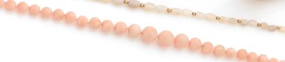 Necklace of falling pink coral balls, the...