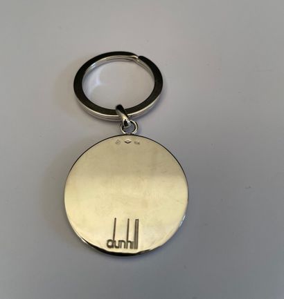 null DUNHILL

Silver key ring 925°/°° with a chased circular pattern of a car driver...