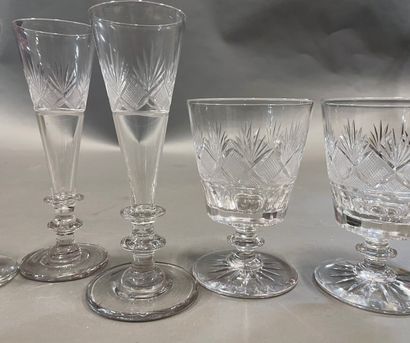 null Part of a crystal glass set with twelve water glasses and nine champagne fl...