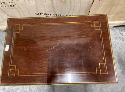 null A mahogany veneered game table inlaid with brass fillets, tapered legs with...