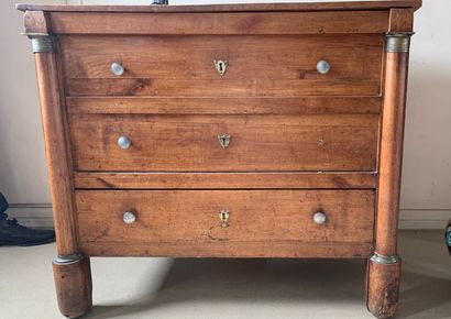 null Walnut chest of drawers opening with a flap and two drawers, the posts with...
