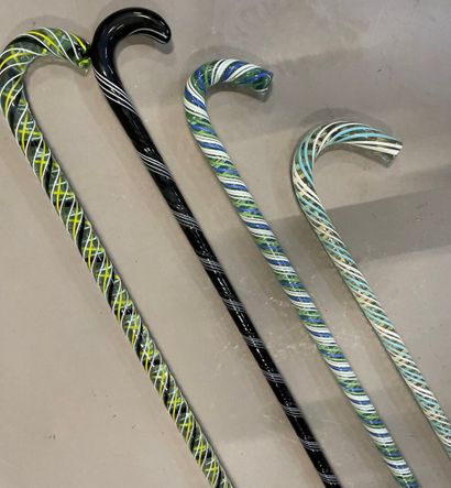 null Four translucent polychrome spun glass swan-neck canes.

Venice, 20th century

H...