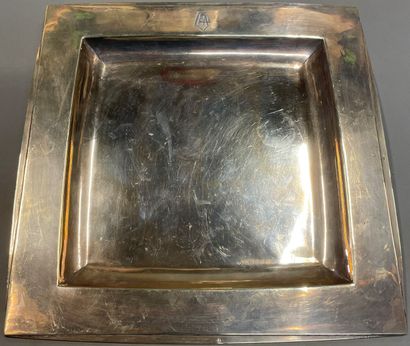 null Square silver dish with the number CMP.

Minerva mark, signed Jean E. Puiforcat.

Weight...