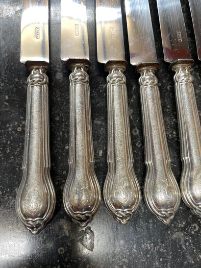 null LAPAR

Knife set, the silver handle with chased leaf design, engraved JJV, comprising...
