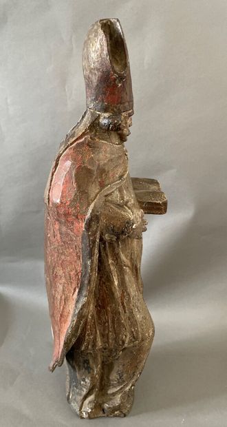 St Augustin 
Sculpture en bois polychrome 
Inscription gravée au dos : GP RICARD,...
