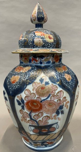 A porcelain baluster-shaped covered vase...