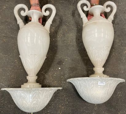 Pair of wall sconces in alabaster carved...