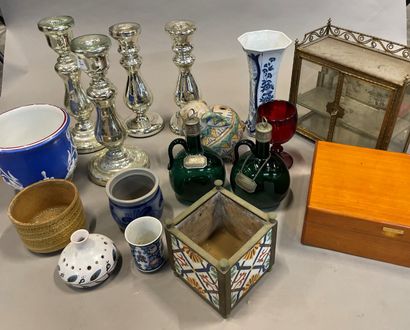 null Case of various trinkets including eglomerate glass torches, planters, carafes...