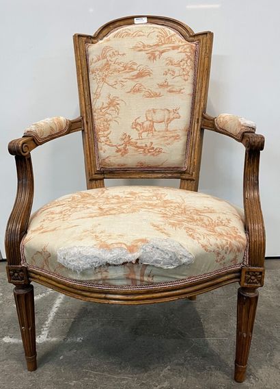 Armchair in molded and carved natural wood,...